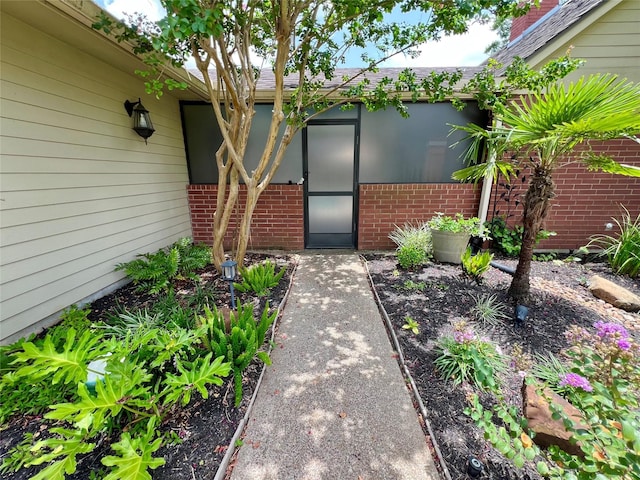 51 S Trillium Ct, Lake Jackson, TX 77566 - property entrance featuring brick siding