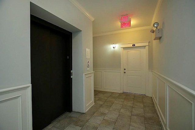 2802 Morrison St Unit 401, Houston, TX 77009 - corridor with a decorative wall, ornamental molding, stone tile flooring, and a wainscoted wall