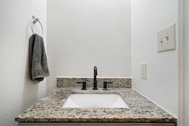 28915 Crested Butte Dr, Katy, TX 77494 - bathroom featuring vanity and a textured wall