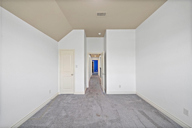 28915 Crested Butte Dr, Katy, TX 77494 - carpeted spare room featuring baseboards and vaulted ceiling