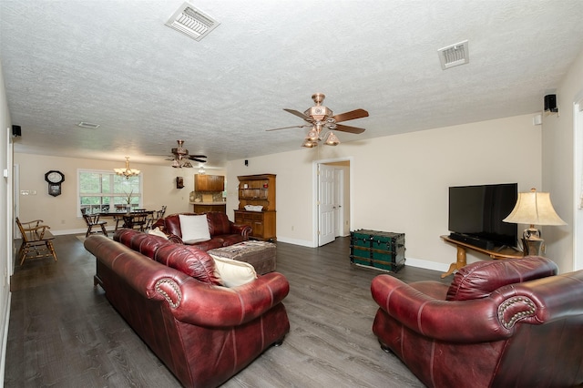 505 Sage Brush Dr, Somerville, TX 77879 - living area featuring wood finished floors, a ceiling fan, a textured ceiling, and a chandelier