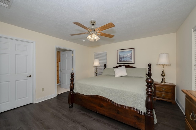 505 Sage Brush Dr, Somerville, TX 77879 - bedroom featuring wood finished floors, a textured ceiling, and ceiling fan