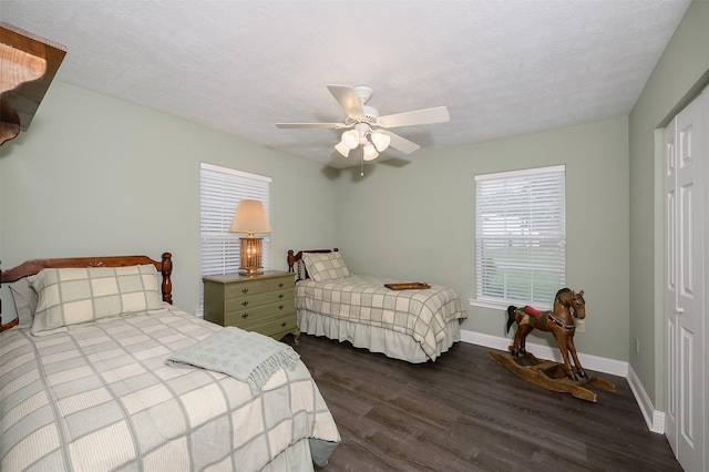 505 Sage Brush Dr, Somerville, TX 77879 - bedroom featuring dark wood finished floors, a closet, and a ceiling fan