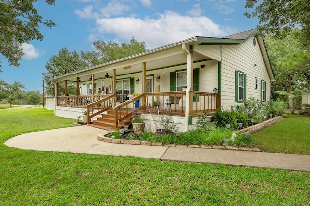 505 Sage Brush Dr, Somerville, TX 77879 - view of front of house with covered porch, a front yard, and ceiling fan