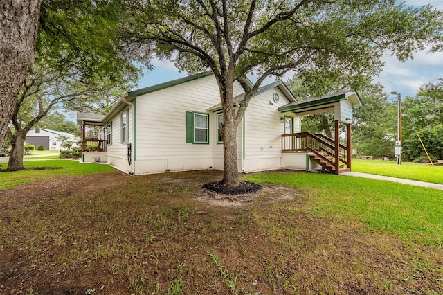 505 Sage Brush Dr, Somerville, TX 77879 - view of side of home with a yard