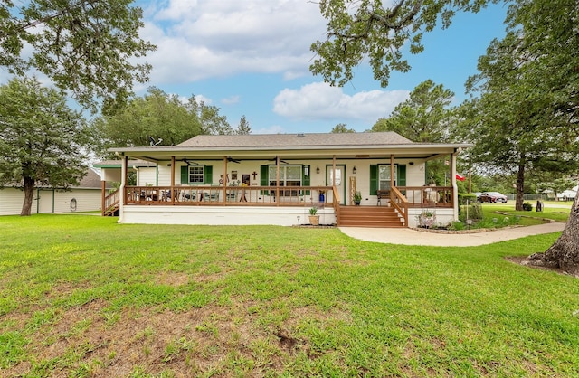 505 Sage Brush Dr, Somerville, TX 77879 - back of house featuring a ceiling fan, a porch, and a yard