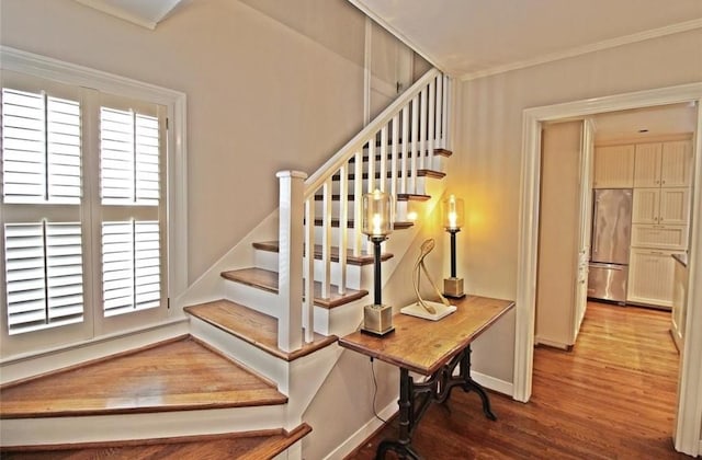 1216 S Shepherd Dr, Houston, TX 77019 - stairs featuring wood finished floors and ornamental molding