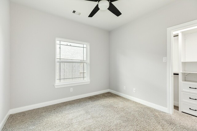 133 Water Grass Trl, Clute, TX 77531 - unfurnished bedroom with carpet flooring and a ceiling fan