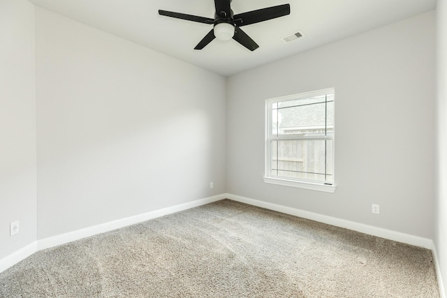 133 Water Grass Trl, Clute, TX 77531 - carpeted spare room with baseboards and a ceiling fan