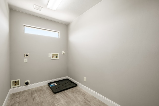 14910 High Meadow Ln, Baytown, TX 77523 - laundry room featuring electric dryer hookup, washer hookup, and hookup for a gas dryer