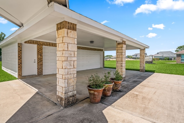 14910 High Meadow Ln, Baytown, TX 77523 - view of patio with a garage, concrete driveway, and a carport