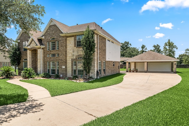 14910 High Meadow Ln, Baytown, TX 77523 - french country home with concrete driveway, brick siding, a front yard, and roof with shingles