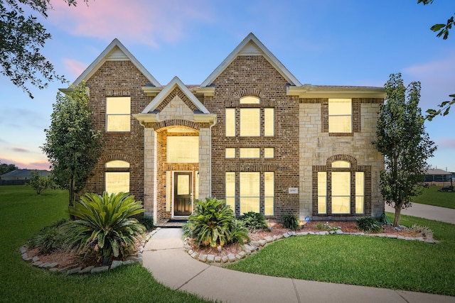 14910 High Meadow Ln, Baytown, TX 77523 - view of front of house with a yard and brick siding