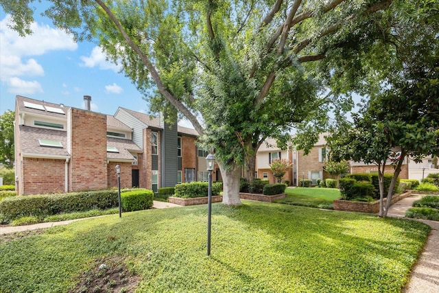 5940 Woodway Place Ct, Houston, TX 77057 - view of front of property with brick siding and a front lawn