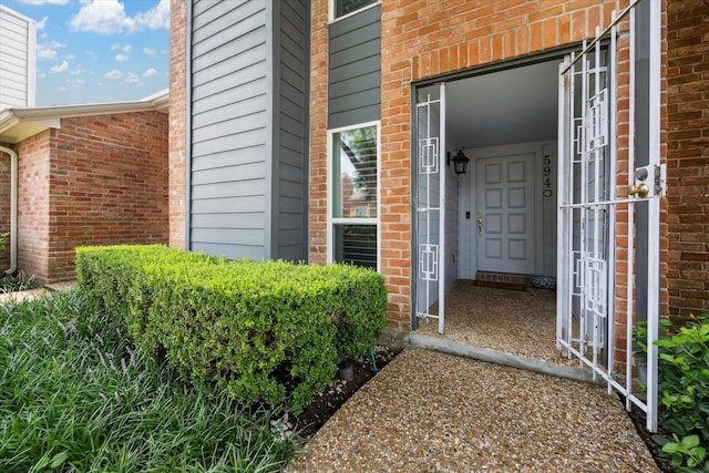 5940 Woodway Place Ct, Houston, TX 77057 - property entrance with brick siding
