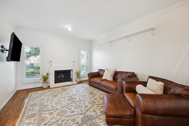 5940 Woodway Place Ct, Houston, TX 77057 - living area with crown molding, wood finished floors, and a brick fireplace