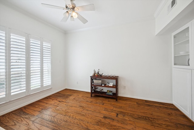 5940 Woodway Place Ct, Houston, TX 77057 - spare room featuring crown molding, wood-type flooring, plenty of natural light, and ceiling fan