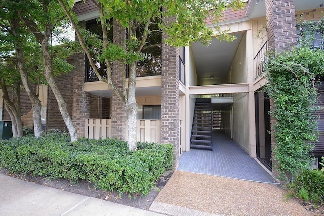 7555 Katy Fwy Unit 57, Houston, TX 77024 - view of building exterior with stairway