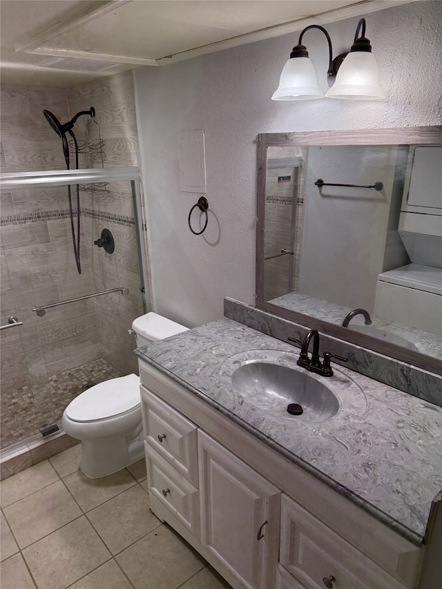 7555 Katy Fwy Unit 57, Houston, TX 77024 - full bath with vanity, tile patterned floors, and a stall shower