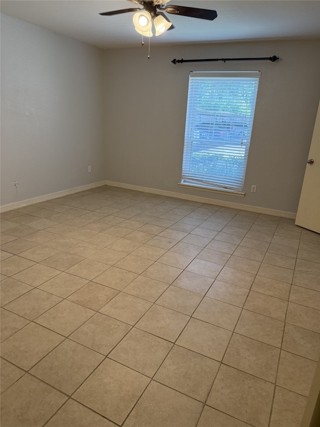 7555 Katy Fwy Unit 57, Houston, TX 77024 - empty room with a ceiling fan and baseboards