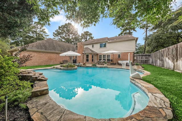 9727 Godstone Ln, Spring, TX 77379 - view of swimming pool with a patio area and a fenced backyard