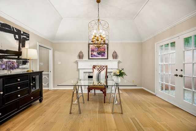 9727 Godstone Ln, Spring, TX 77379 - office area with a chandelier, vaulted ceiling, light wood-style flooring, healthy amount of natural light, and french doors