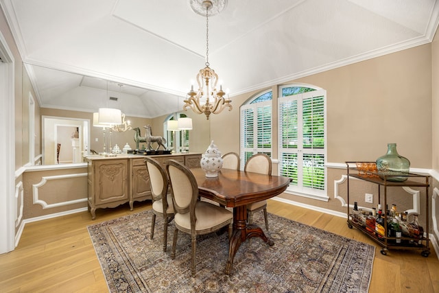 9727 Godstone Ln, Spring, TX 77379 - dining room with a chandelier, light wood-style flooring, healthy amount of natural light, and vaulted ceiling