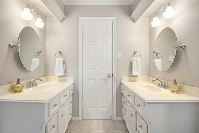 9727 Godstone Ln, Spring, TX 77379 - bathroom featuring two vanities and crown molding