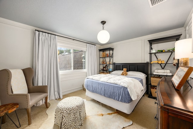9727 Godstone Ln, Spring, TX 77379 - bedroom with light carpet and ornamental molding