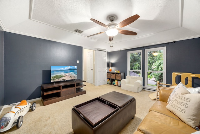 9727 Godstone Ln, Spring, TX 77379 - carpeted living room featuring a ceiling fan and a textured ceiling