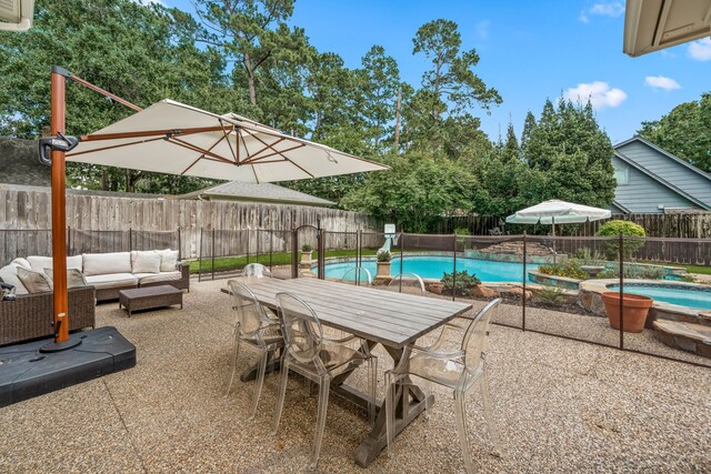 9727 Godstone Ln, Spring, TX 77379 - view of pool featuring outdoor lounge area, a fenced backyard, a patio, and outdoor dining space