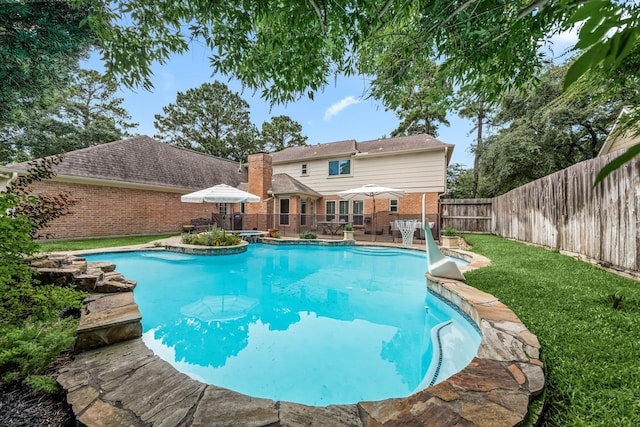 9727 Godstone Ln, Spring, TX 77379 - view of swimming pool with a fenced backyard and a patio area