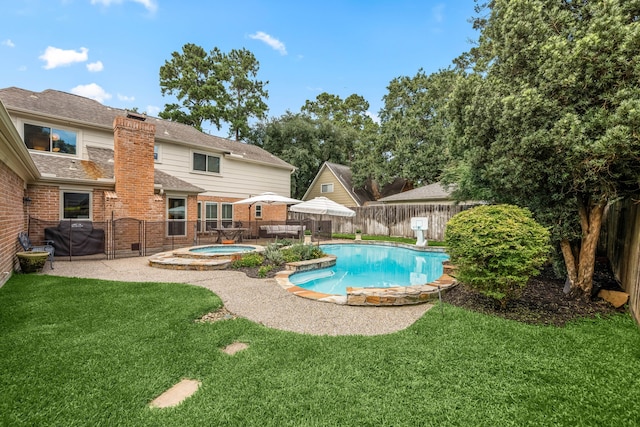 9727 Godstone Ln, Spring, TX 77379 - view of swimming pool with a fenced backyard, an in-ground hot tub, a grill, and a patio
