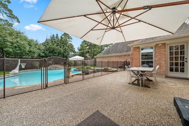 9727 Godstone Ln, Spring, TX 77379 - view of swimming pool featuring a fenced backyard and a patio