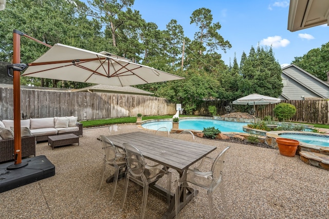 9727 Godstone Ln, Spring, TX 77379 - view of pool with a fenced backyard, an outdoor living space, a patio area, and outdoor dining area