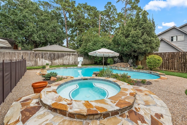 9727 Godstone Ln, Spring, TX 77379 - view of pool with a fenced backyard and a pool with connected hot tub