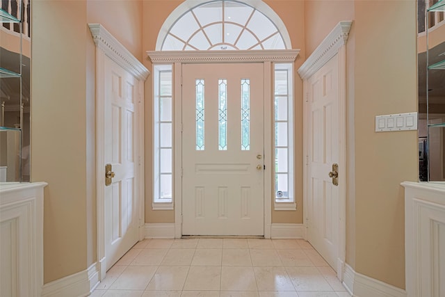 3665 Maranatha Dr, Sugar Land, TX 77479 - entrance foyer featuring light tile patterned flooring and baseboards