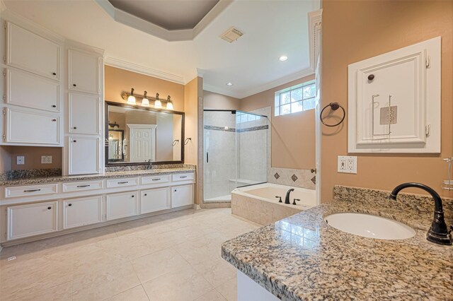 3665 Maranatha Dr, Sugar Land, TX 77479 - bathroom with a stall shower, two vanities, a bath, ornamental molding, and tile patterned floors