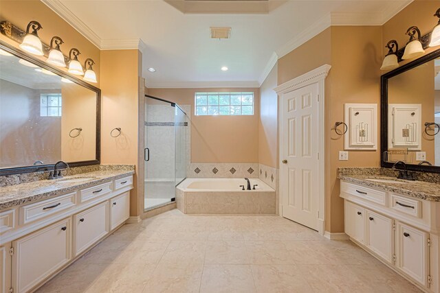 3665 Maranatha Dr, Sugar Land, TX 77479 - bathroom featuring a bath, a shower stall, two vanities, ornamental molding, and recessed lighting