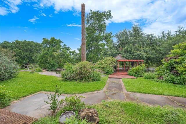 3665 Maranatha Dr, Sugar Land, TX 77479 - view of grassy yard with a gazebo