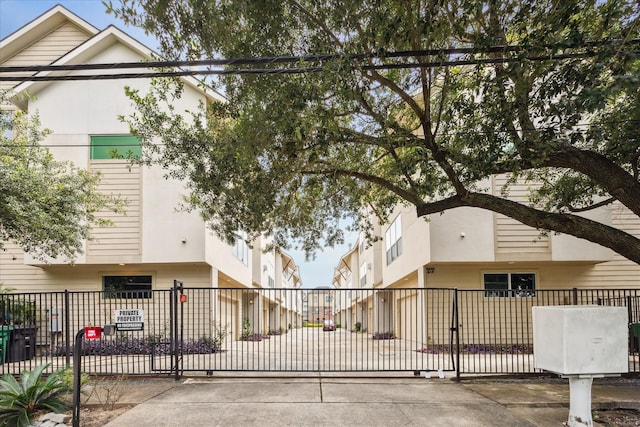 5219 Kiam St Unit F, Houston, TX 77007 - view of front of property with stucco siding