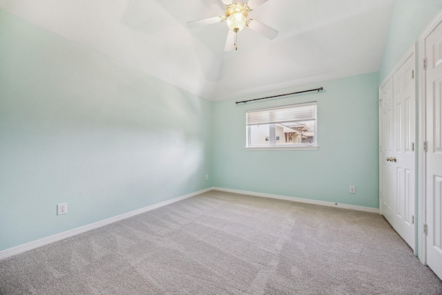 4404 Wendell St, Bellaire, TX 77401 - unfurnished bedroom with carpet floors, lofted ceiling, and a ceiling fan