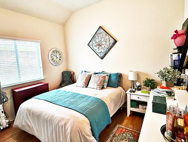 8010 N Tarrytown Crossing Dr, Conroe, TX 77304 - bedroom featuring wood finished floors and lofted ceiling