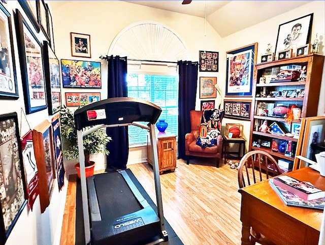 8010 N Tarrytown Crossing Dr, Conroe, TX 77304 - exercise room with wood finished floors, vaulted ceiling, and ceiling fan