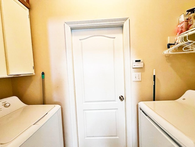 8010 N Tarrytown Crossing Dr, Conroe, TX 77304 - laundry room with cabinet space and washer and dryer