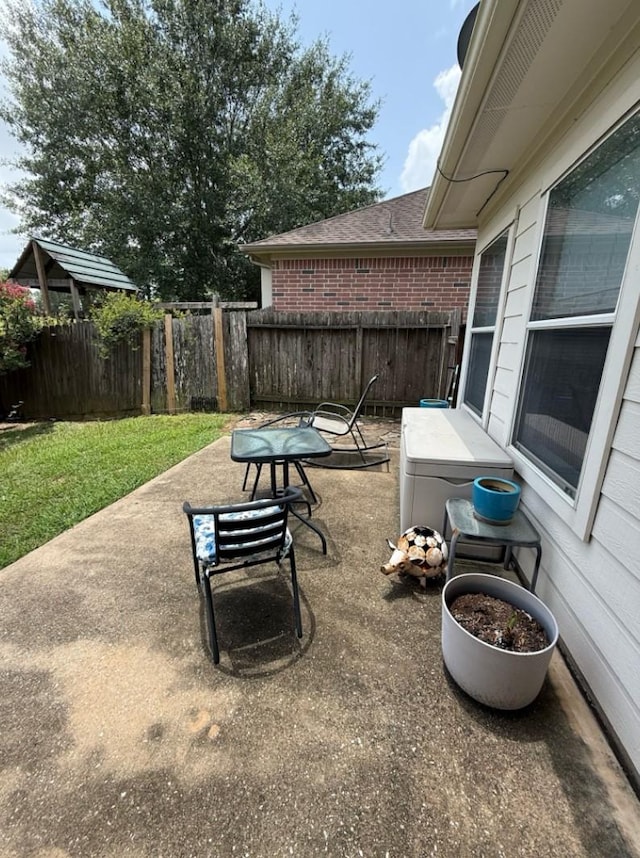 8010 N Tarrytown Crossing Dr, Conroe, TX 77304 - fenced backyard with a patio area