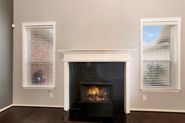 216 Willow Pointe Dr, League City, TX 77573 - detailed view of a tile fireplace and wood finished floors
