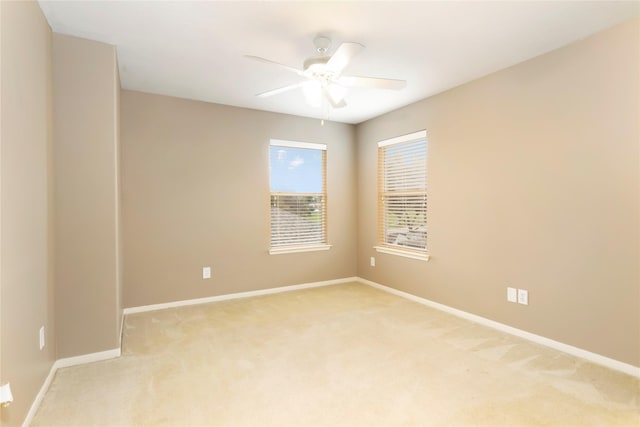 216 Willow Pointe Dr, League City, TX 77573 - empty room featuring light colored carpet and ceiling fan