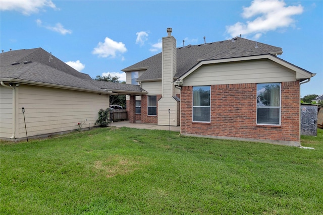 216 Willow Pointe Dr, League City, TX 77573 - back of property featuring a patio area, brick siding, and roof with shingles