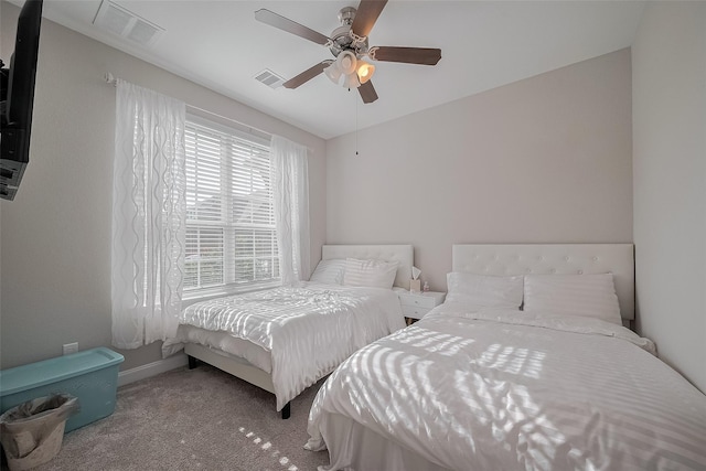 11527 Taagan Ln, Richmond, TX 77407 - carpeted bedroom featuring ceiling fan and baseboards
